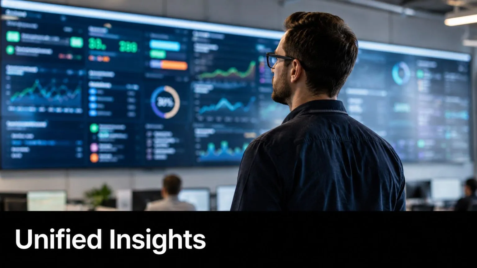 A professional analyzing a large digital dashboard showing data visualization charts and metrics in an office.